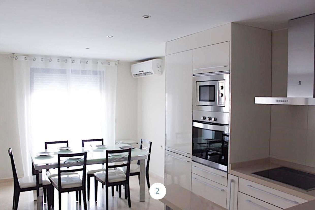 Apartamento El Eden Playa De Gandia Bagian luar foto